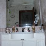 Bathroom with wash basin, bath / shower, and toilet