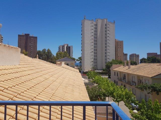 Four bedroom, two bathroom South-facing med-terrace townhouse just 300m from Campoamor beach