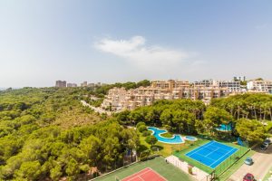 South-facing three bedroom, two bathroom apartment with sea views in Campoamor