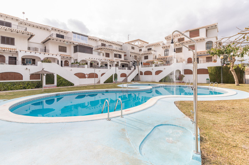 Three bedroom, two bathroom South-facing triplex property for sale in Cabo Roig