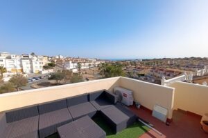 Lovely two bed, one bath apartment with roof-top solarium for sale in Villamartin, Orihuela-Costa. Alicante. Spain.