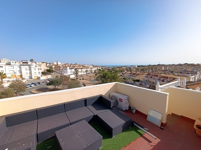 Lovely two bed, one bath apartment with roof-top solarium for sale in Villamartin, Orihuela-Costa. Alicante. Spain.